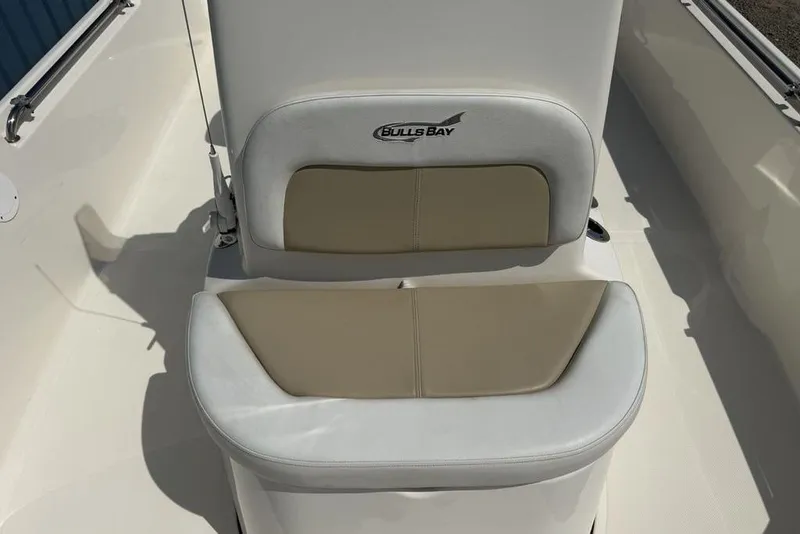 Slide: The Image of 2023 Bulls Bay 2400 boat seat with beige and white upholstery. - 14