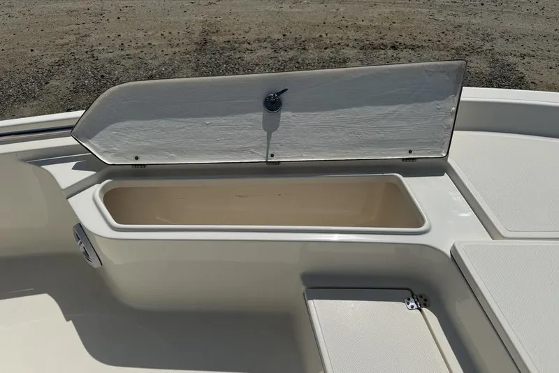 Slide: The Image of Open storage compartment on 2023 Bulls Bay 2400 boat deck. - 15