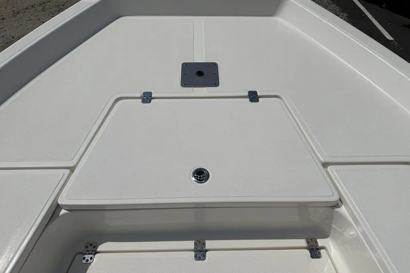 Slide: The Image of 2023 Bulls Bay 2400 boat deck with storage compartment and hatch. - 4