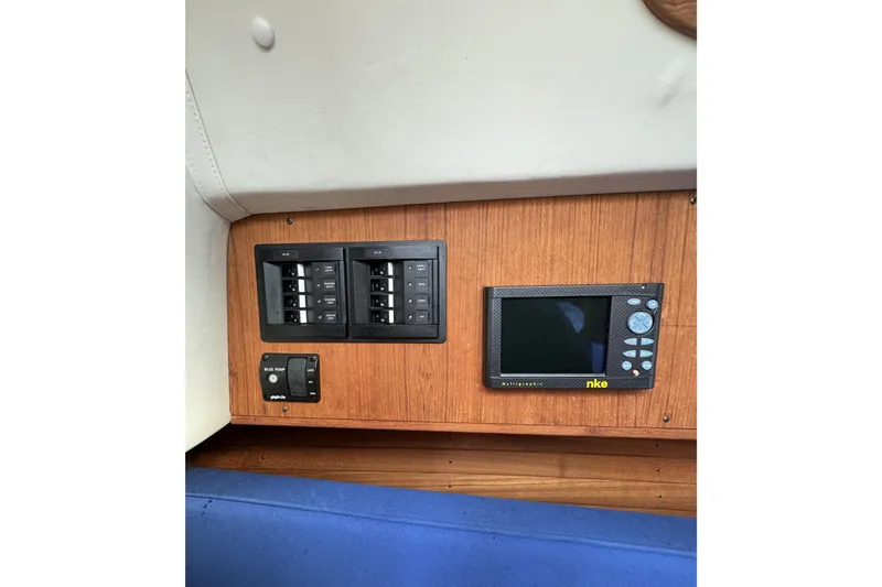 Slide: The Image of Control panel and display on 2017 Alerion Express 28 sailboat interior. - 21