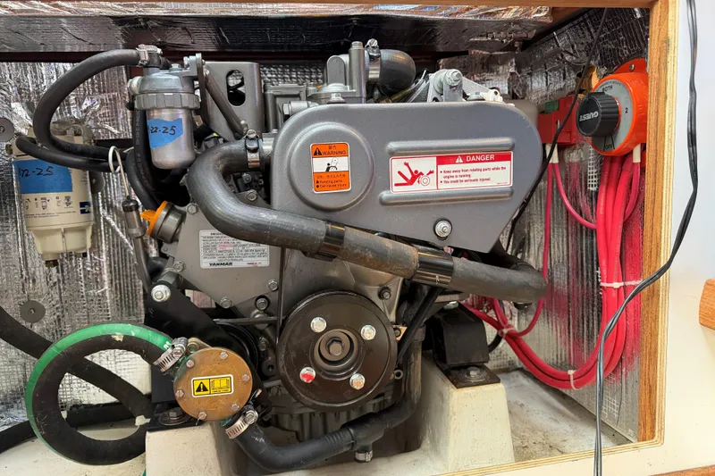 Slide: The Image of Engine compartment of a 2017 Alerion Express 28 sailboat, featuring Yanmar components. - 25