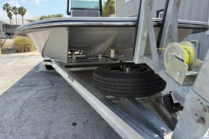 Slide: The Image of 2026 SCB S22 boat on trailer, featuring sleek design and sturdy construction. - 3
