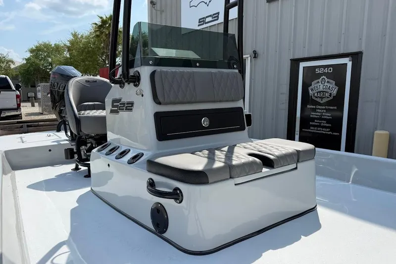 Slide: The Image of 2026 SCB S22 boat with seating and console, displayed at West Coast Marine. - 5