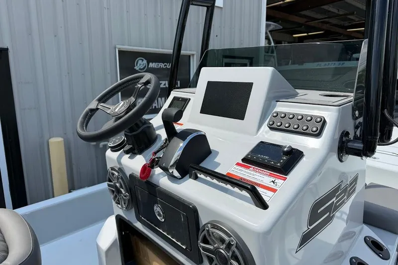 Slide: The Image of 2026 SCB S22 boat dashboard with steering wheel and control panel. - 9