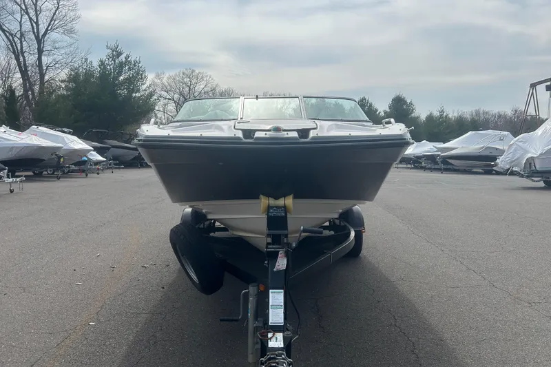 Slide: The Image of 2015 Yamaha Boats SX210 on trailer in outdoor storage lot. - 2