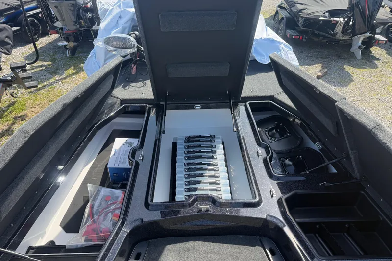 Slide: The Image of 2026 Skeeter ZXE21 boat interior with storage compartments and equipment. - 10