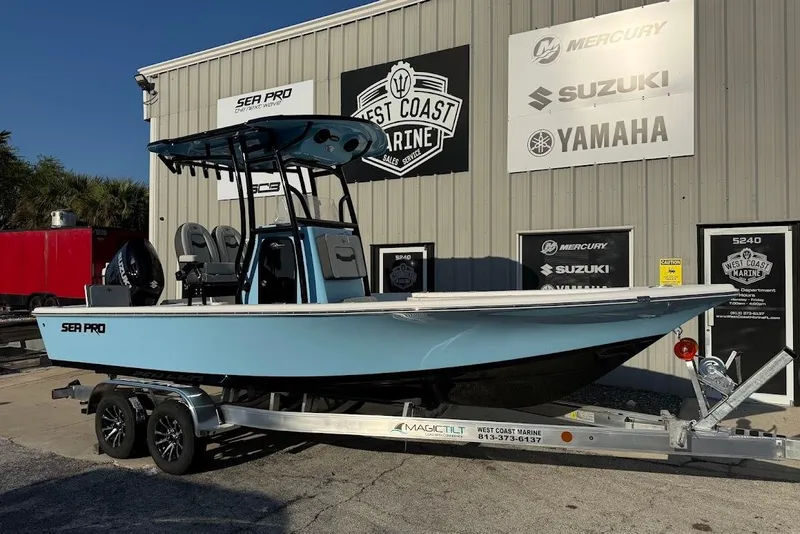 The Image of 2026 Sea Pro 230 Bay boat on trailer at West Coast Marine dealership. - 1