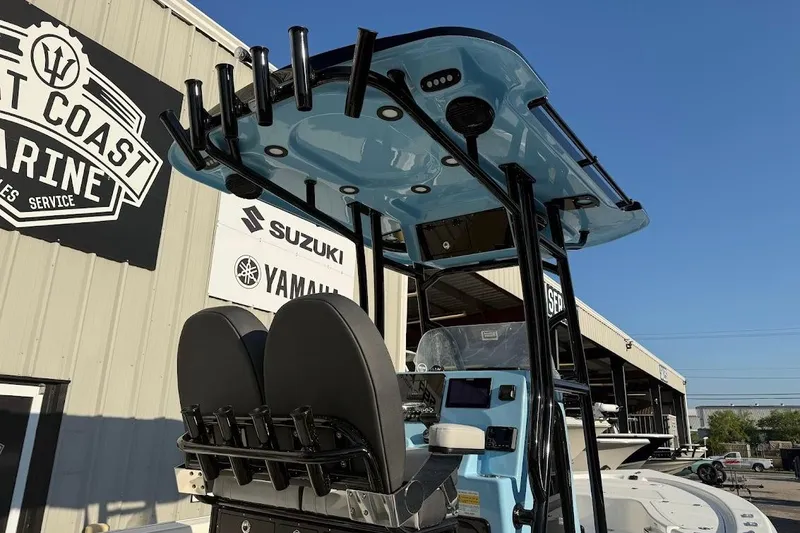 Slide: The Image of 2026 Sea Pro 230 Bay boat at West Coast Marine, featuring dual seats and rod holders. - 11