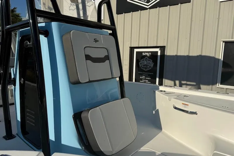 Slide: The Image of 2026 Sea Pro 230 Bay boat interior with cushioned seating and sleek design. - 3