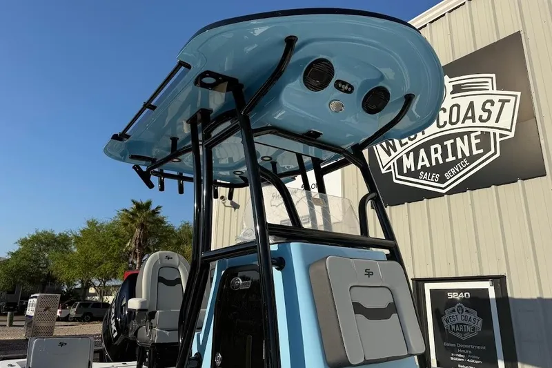 Slide: The Image of 2026 Sea Pro 230 Bay boat at West Coast Marine dealership, showcasing sleek design and features. - 4