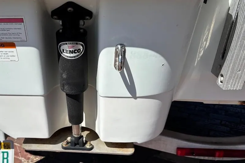 Slide: The Image of Close-up of a 2009 Ranger Banshee boat with Lenco trim tab actuator. - 12