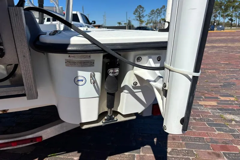 Slide: The Image of 2009 Ranger Banshee boat stern with Lenco trim tab and protective design label. - 13