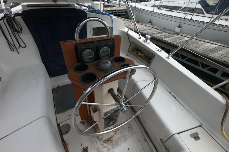 Slide: The Image of Cockpit of 1982 Irwin 34 Citation sailboat with steering wheel and instrument panel. - 27