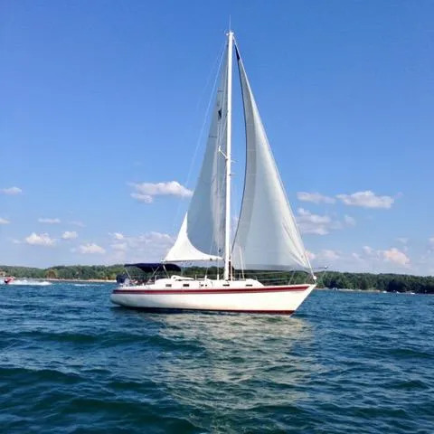 Slide: The Image of 1982 Irwin 34 Citation sailboat on open water. - 5