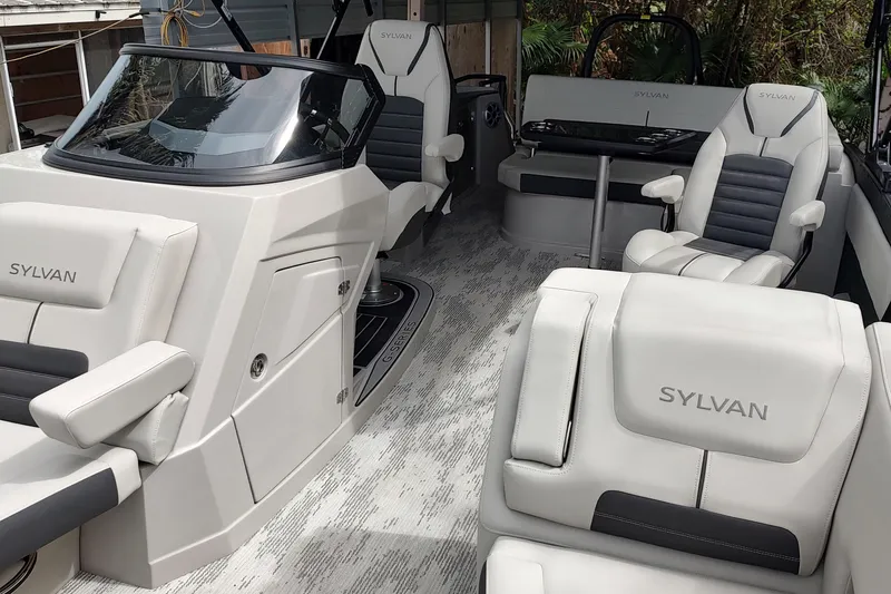 Slide: The Image of Luxurious interior of 2026 Sylvan G3 CLZ DH boat with plush seating and modern design. - 16