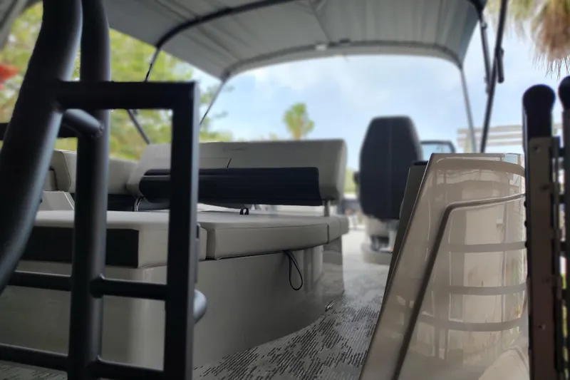 Slide: The Image of Interior view of 2026 Sylvan G3 CLZ DH boat with seating and canopy. - 17