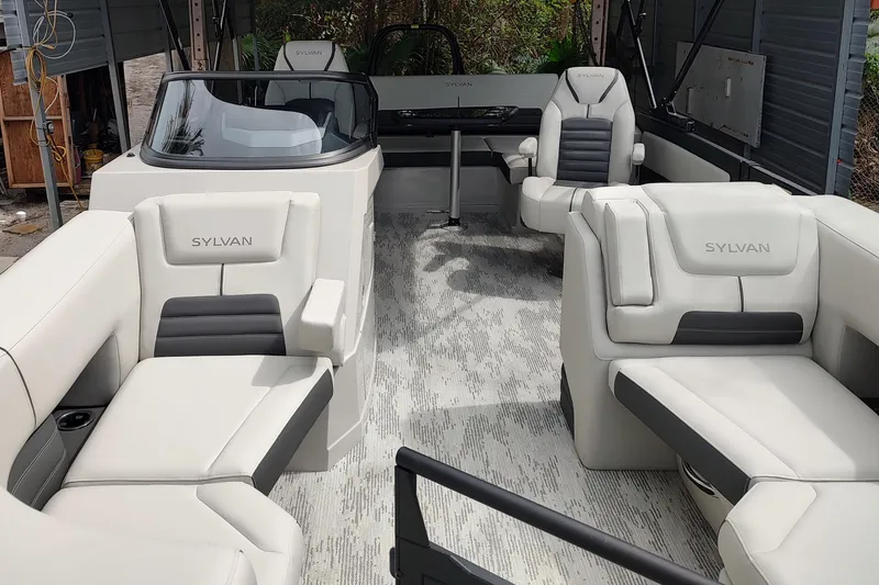 Slide: The Image of Luxurious interior of 2026 Sylvan G3 CLZ DH boat with plush seating and modern design. - 2