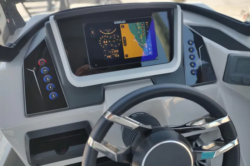 Slide: The Image of 2026 Sylvan G3 CLZ DH boat dashboard with modern controls and touchscreen display. - 29