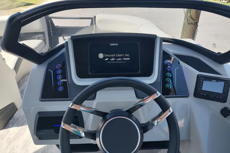 Slide: The Image of 2026 Sylvan G3 CLZ DH boat dashboard with modern steering and digital controls. - 31