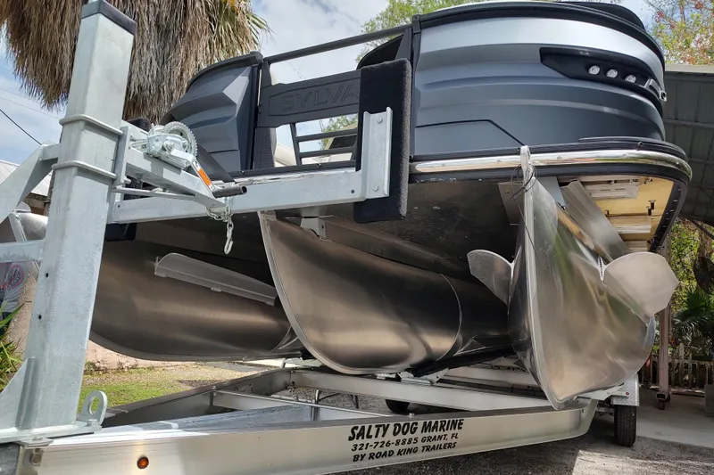 Slide: The Image of 2026 Sylvan G3 CLZ DH pontoon boat on trailer, viewed from below. - 5