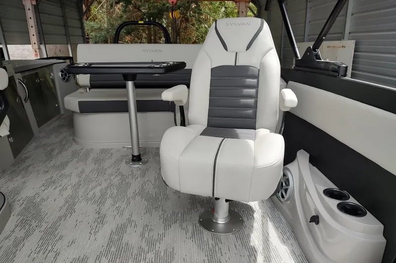 Slide: The Image of Interior of 2026 Sylvan G3 CLZ DH boat with plush seating and modern design. - 9