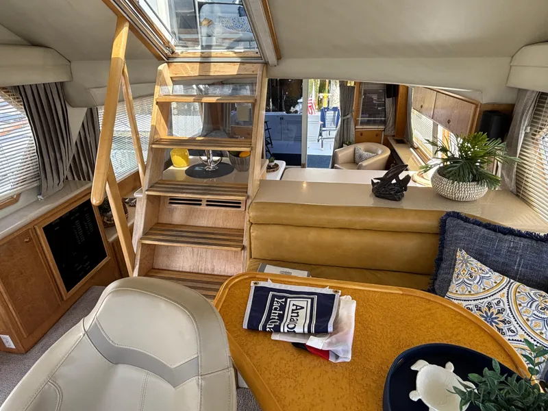 Slide: The Image of Luxurious interior of a 2000 Navigator 5300 yacht with elegant seating and decor. - 14
