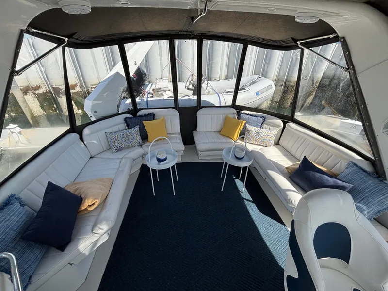 Slide: The Image of Luxurious interior of 2000 Navigator 5300 yacht with plush seating and elegant decor. - 27