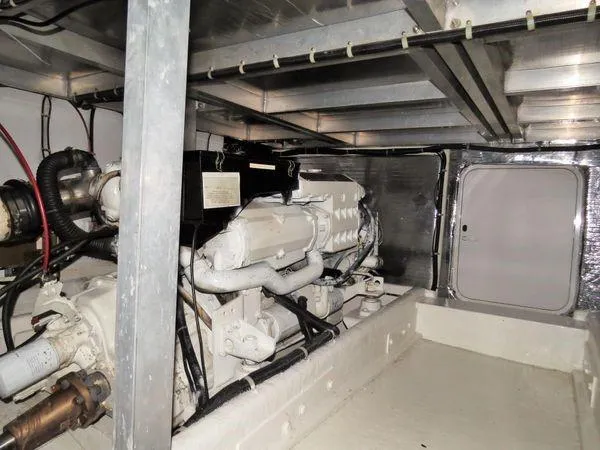 Slide: The Image of Engine room of 2000 Navigator 5300 yacht, showcasing machinery and components. - 29