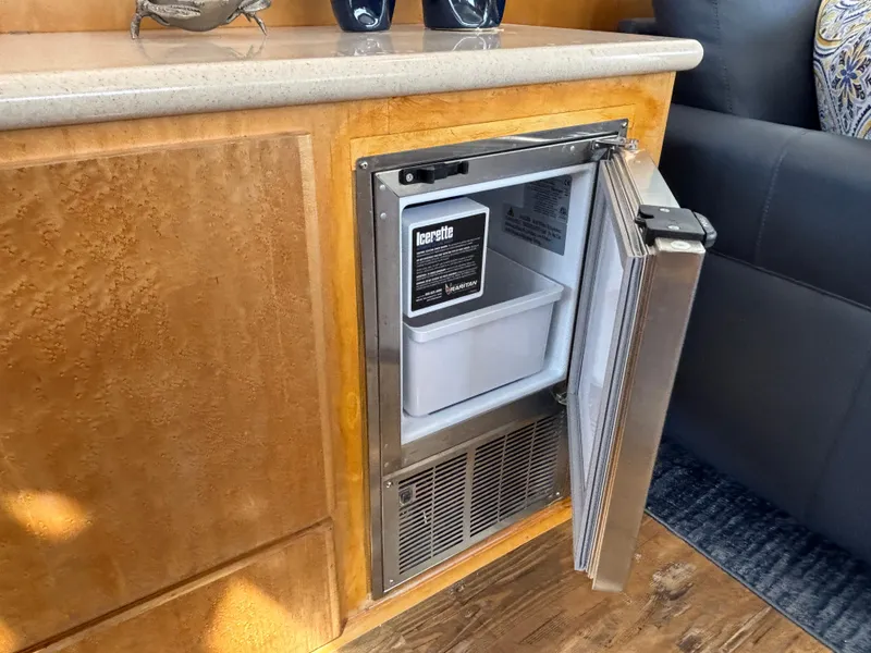Slide: The Image of Small built-in refrigerator in a 2000 Navigator 5300 yacht interior. - 8