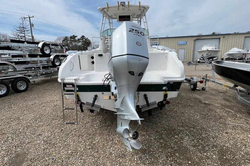 Slide: The Image of 2006 Striper 2301 Walkaround OB boat with Honda 250 VTEC outboard motor. - 26