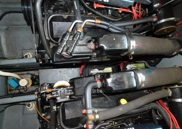 Slide: The Image of Engine compartment of 1995 Sea Ray 330 Express Cruiser. - 10