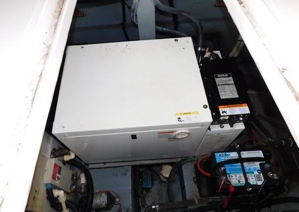 Slide: The Image of Engine compartment of 1995 Sea Ray 330 Express Cruiser. - 16