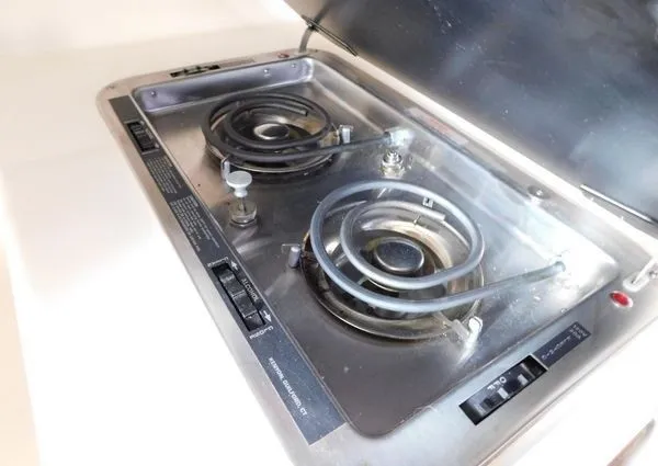 Slide: The Image of Stovetop on 1995 Sea Ray 330 Express Cruiser. - 24