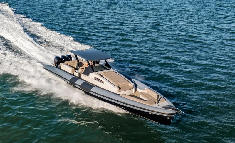 Slide: The Image of 2019 Chaser 500R boat cruising on open water, showcasing sleek design and powerful engines. - 17