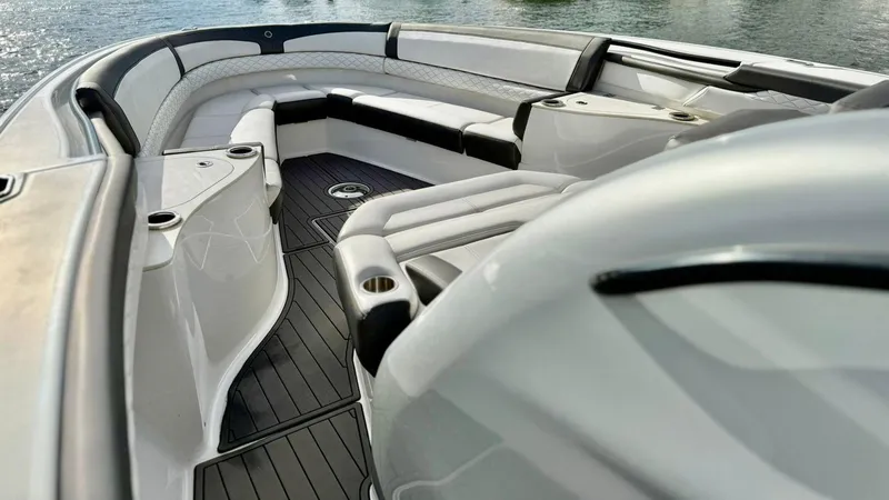 Slide: The Image of Luxury seating area on a 2020 Fountain 43NX boat, featuring sleek design and modern amenities. - 13