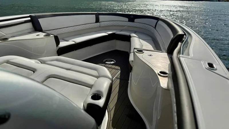 Slide: The Image of Luxurious seating area on a 2020 Fountain 43NX boat, with ocean view. - 14