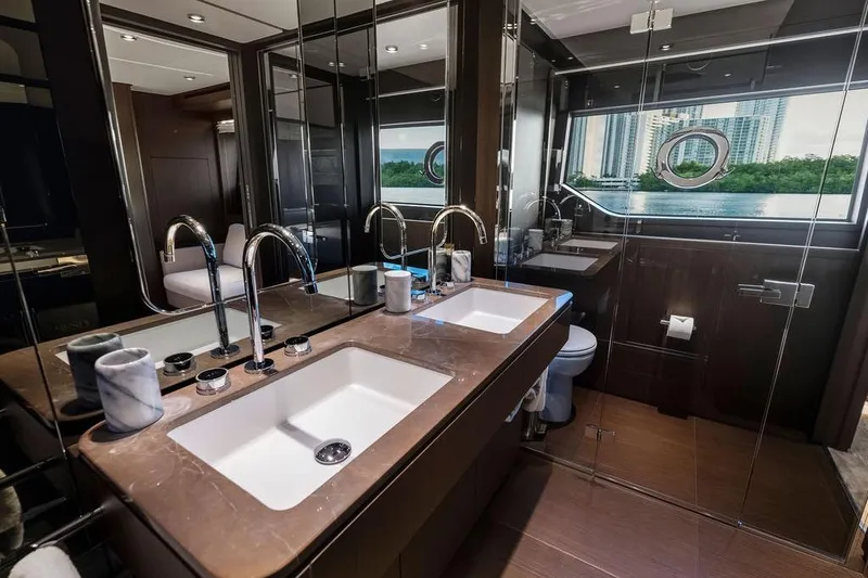 Slide: The Image of Luxurious bathroom in 2023 Ferretti Yachts 860, featuring dual sinks and modern fixtures. - 44
