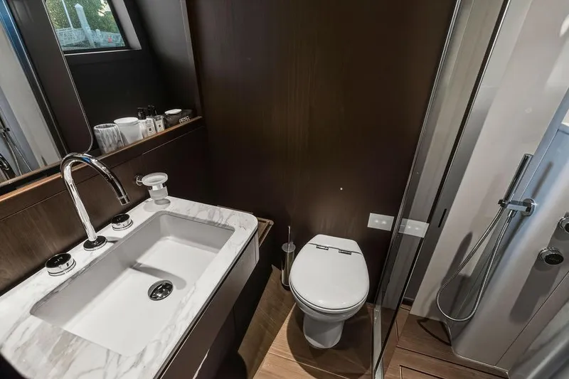Slide: The Image of Luxurious bathroom in 2023 Ferretti Yachts 860, featuring modern fixtures and elegant design. - 55