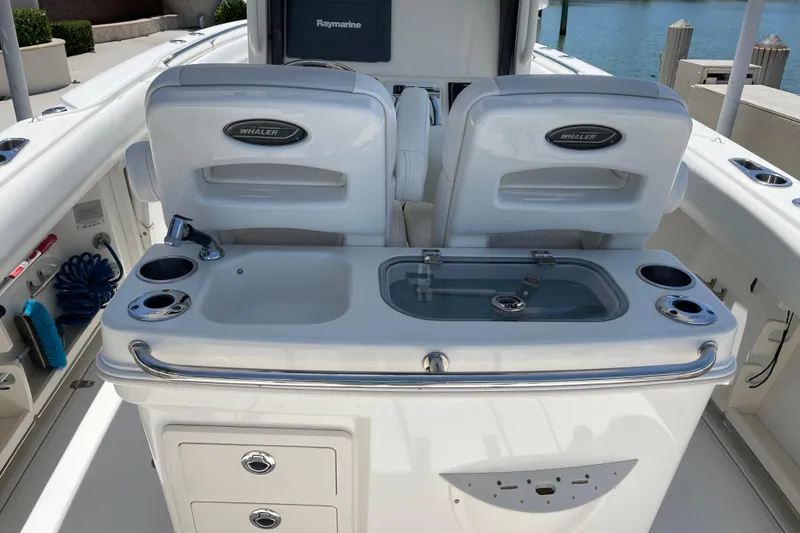 Slide: The Image of 2009 Boston Whaler 280 Outrage boat interior with seating and fishing station. - 15