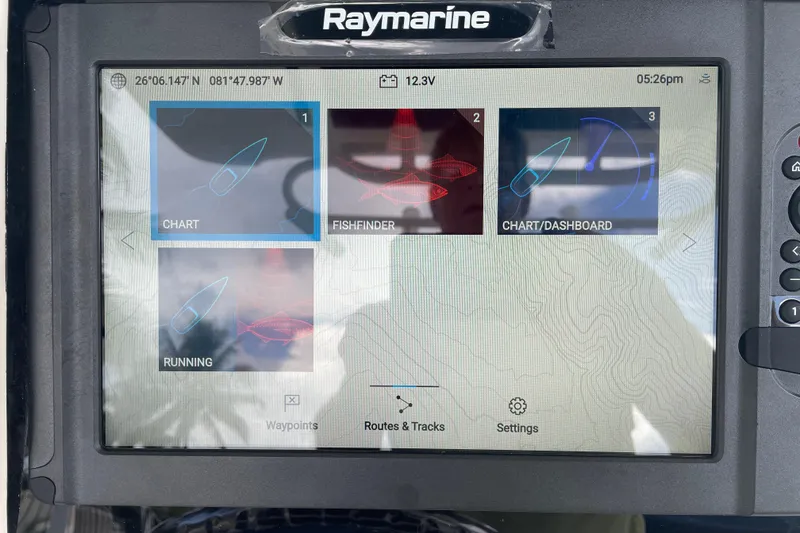 Slide: The Image of Raymarine navigation display on 2009 Boston Whaler 280 Outrage showing chart and fishfinder. - 31