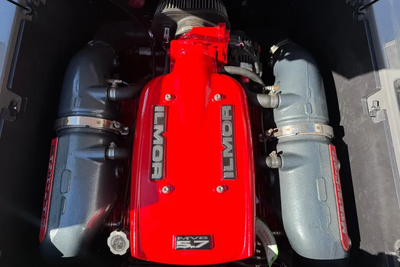 Slide: The Image of Ilmor MV8 5.7 engine in 2015 MasterCraft NXT20 boat, featuring red and gray components. - 20