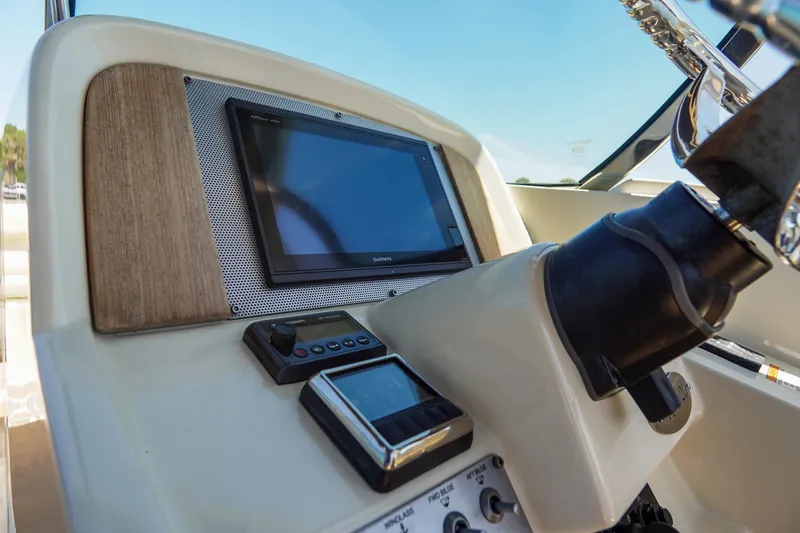 Slide: The Image of Dashboard of 2017 Chris-Craft Calypso 26 boat with Garmin navigation system. - 13