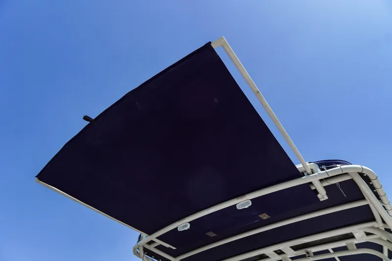 Slide: The Image of Chris-Craft Calypso 26 boat canopy against clear blue sky, 2017 model. - 22