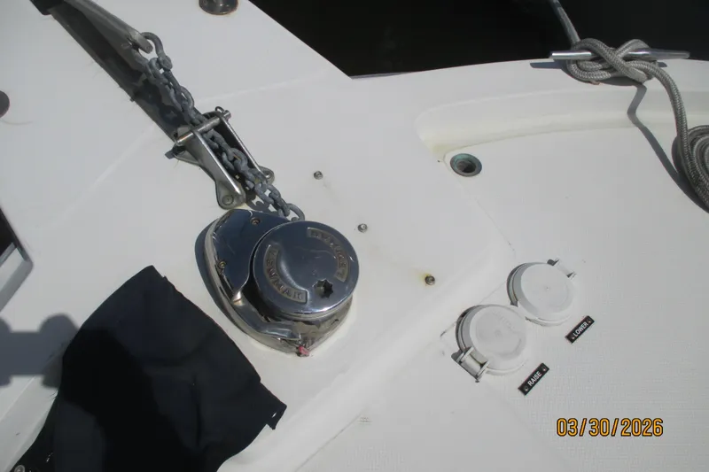Slide: The Image of Anchor winch and controls on 1989 Chris Craft 427 boat deck. - 35