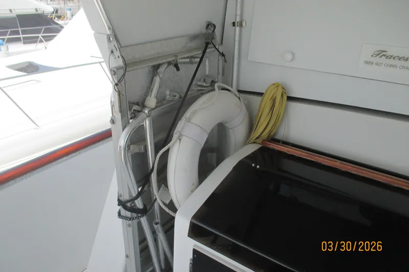 Slide: The Image of 1989 Chris Craft 427 boat interior with life preserver and equipment. - 37