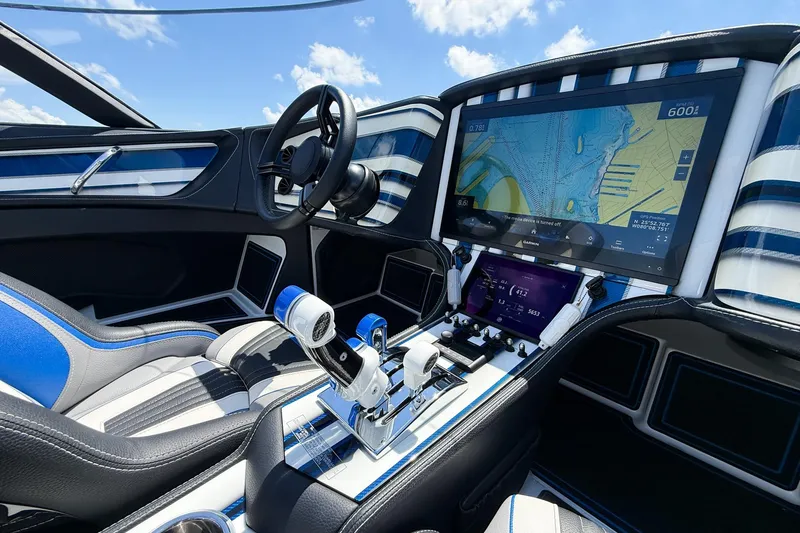 Slide: The Image of 2024 MTI 440X boat cockpit with advanced navigation system and sleek interior design. - 10