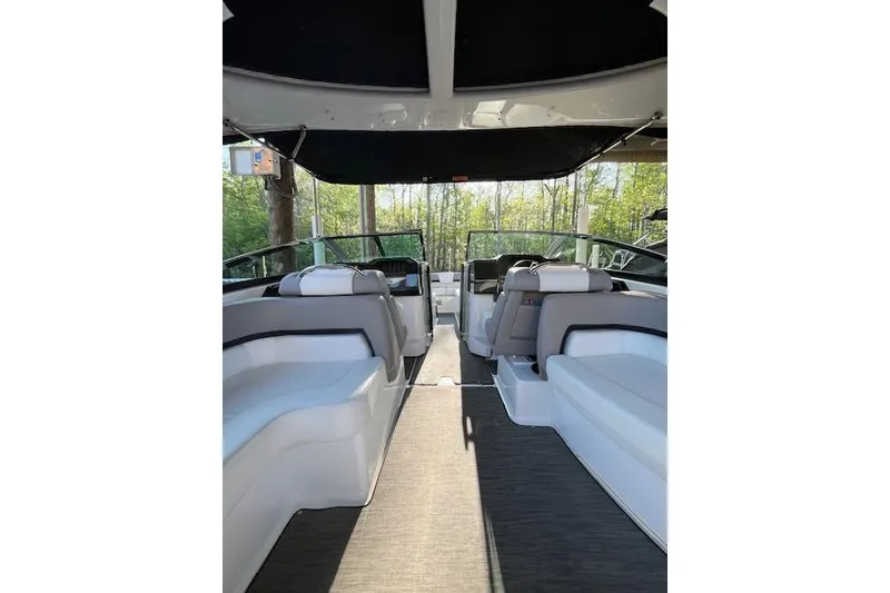 Slide: The Image of Interior view of 2020 Four Winns H290 OB boat with seating and canopy. - 3