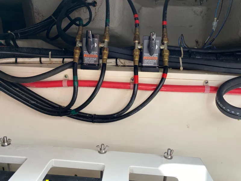 Slide: The Image of Engine compartment wiring of a 2016 Grady-White Freedom 335 boat. - 25