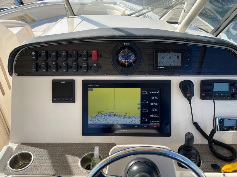 Slide: The Image of Control panel of 2016 Grady-White Freedom 335 boat with navigation equipment. - 5