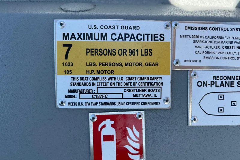 Slide: The Image of U.S. Coast Guard capacity label for 2026 Crestliner 1870 Retriever FCC boat, 7 persons, 961 lbs. - 11